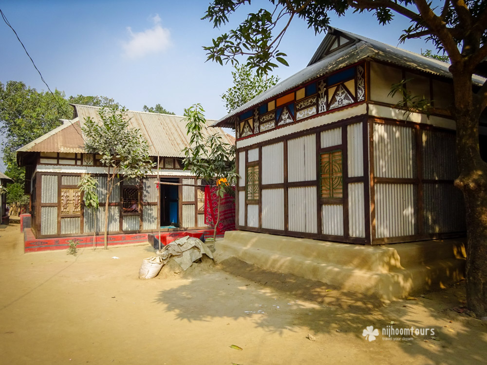 Decorated housed on a river island at Sonargaon