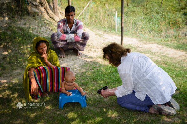 With a child in a village