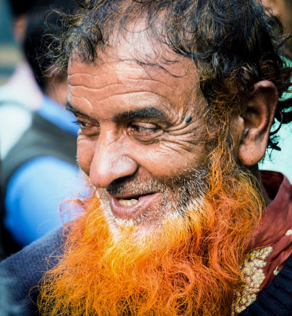 Man with orange beard in Bangladesh.