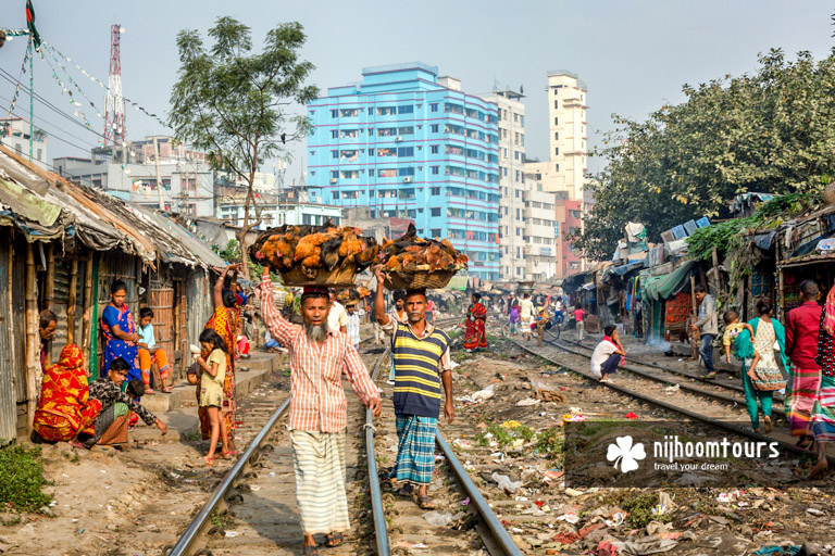 People carrying ducks on the head in Bangladesh