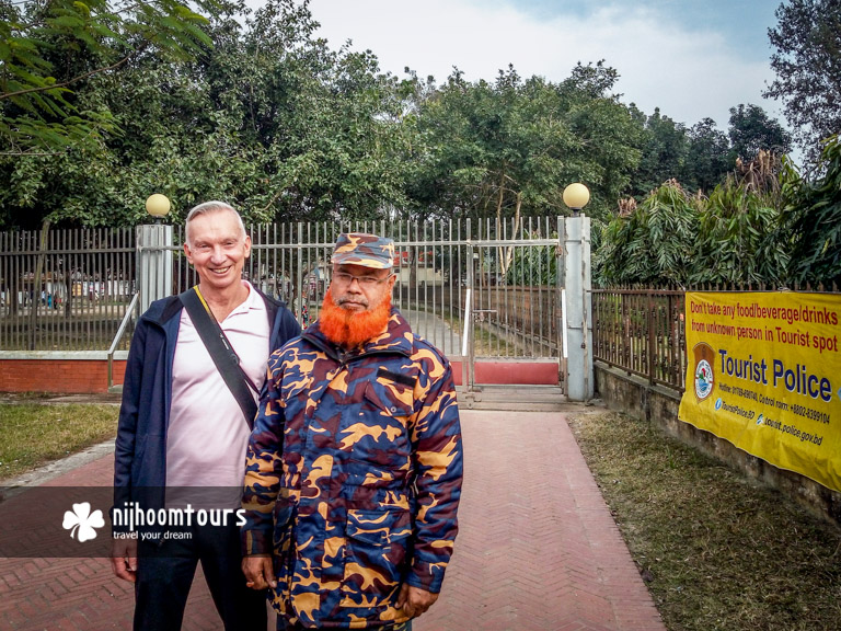 With a guard in Bangladesh with read beard