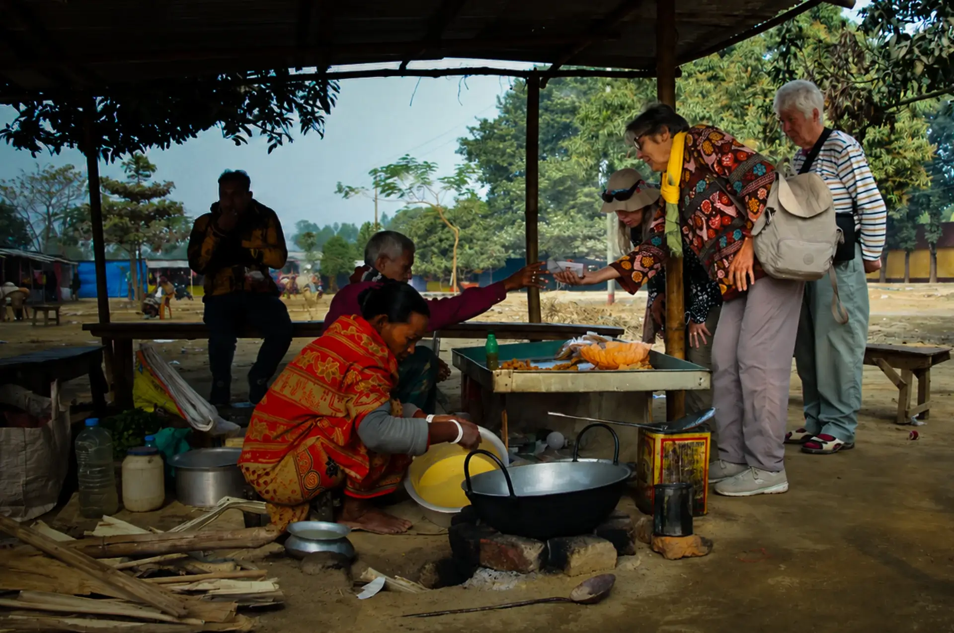 Nijhoom guests at a local food stall