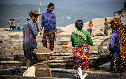 A photo of people collecting sand and stone in Jaflong on the Discover Sylhet tour